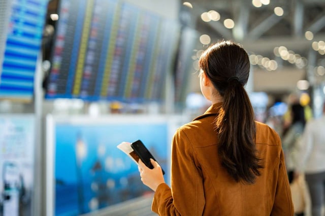 Confident Businesswoman Ready for Airport Travel